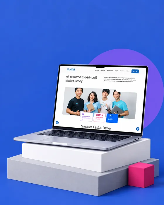 KMS Technology website shown on a laptop on a white plinth